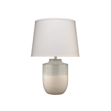 A Sea Glass Table Lamp with a pale blue-green to cream ombre ceramic base and a white lampshade.